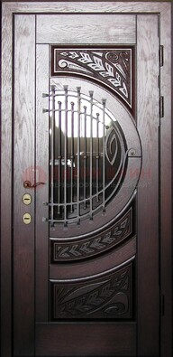 Одностворчатая входная дверь со стеклом и ковкой ДСК-21 в Ликино-Дулево