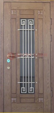 Стандартная железная дверь со стеклом темным и ковкой ДСК-5 в Ликино-Дулево